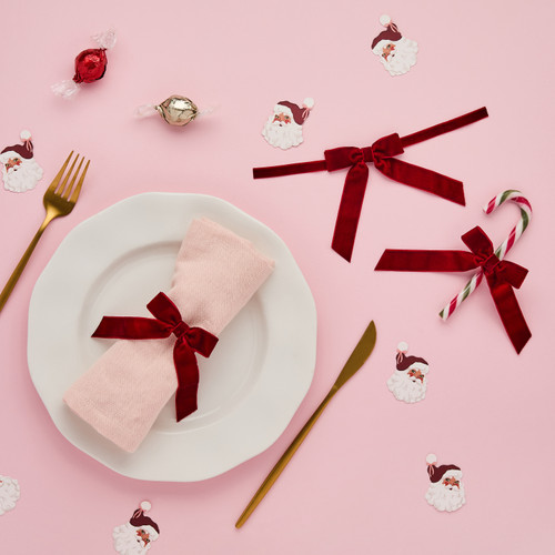 A pack of 6 Red Velvet Bow Tie Decorations.