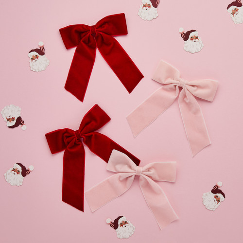 A pack of 6 Pink & Red Velvet Bow Clip Decorations.