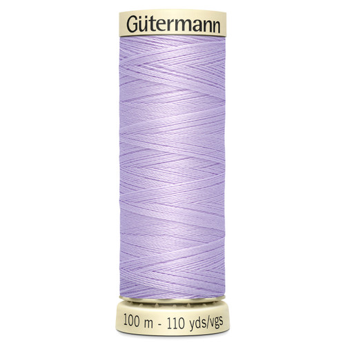 A 100m spool of Orchid Sew All Thread, manufactured by Gutermann.