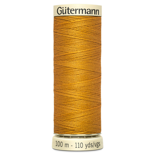 A 100m spool of Old Gold Sew All Thread, manufactured by Gutermann.