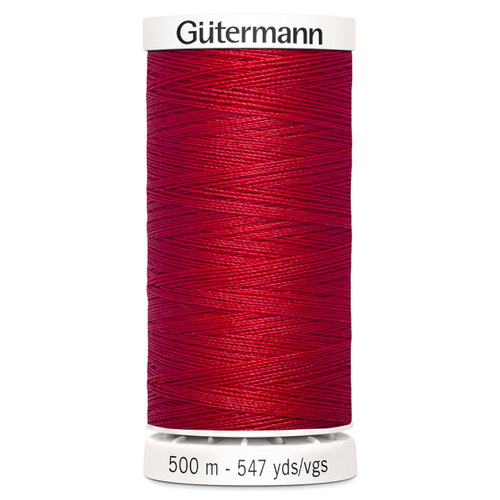 A 500m spool of Red Sew All Thread, manufactured by Gutermann.
