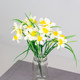 An artificial white Daffodil bunch.