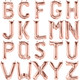 A bargain box containing over 400 16 inch rose gold letter balloons.