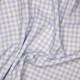 A 110cm x 100cm pre-cut piece of sky blue 6mm gingham polycotton fabric.