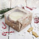 A Christmas Cake Box, manufactured by Hootyballoo.