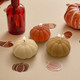 A set of three Pumpkin Candles.