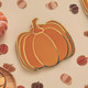 A pack of 8 Orange Pumpkin Paper Plates.