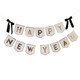 A Happy New Year Card Banner with Black Velvet Bows.