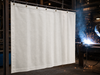 24 oz. Insul-Shield Fiberglass Welding Blanket - Hanging as vertical welding curtain in industrial shop
