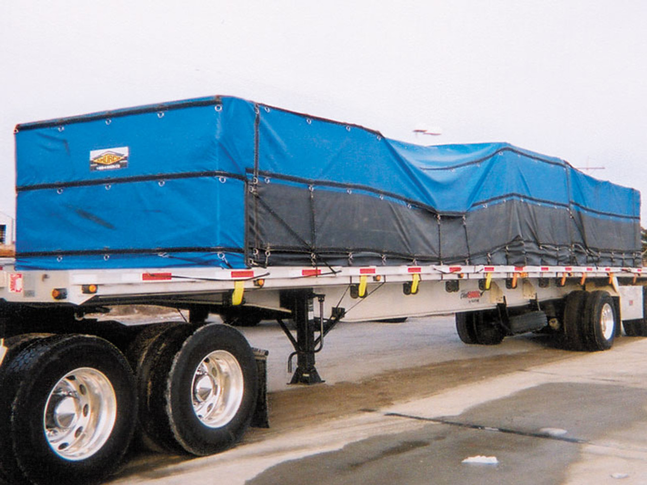 Shur-Co Lumber and Steel tarps, in stock, ready to ship.