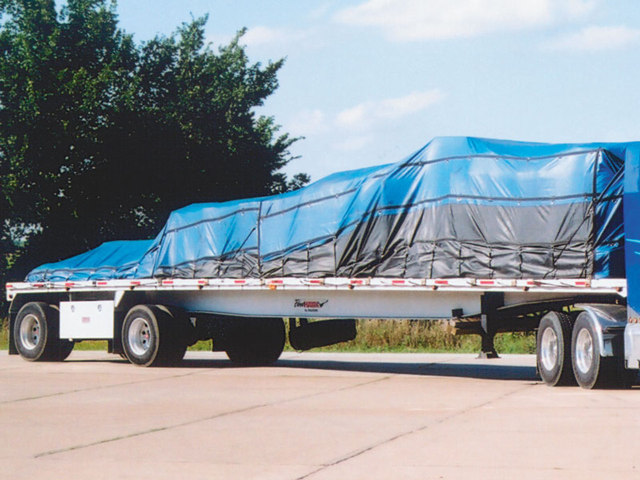 Shur-Co Lumber and Steel tarps, in stock, ready to ship.