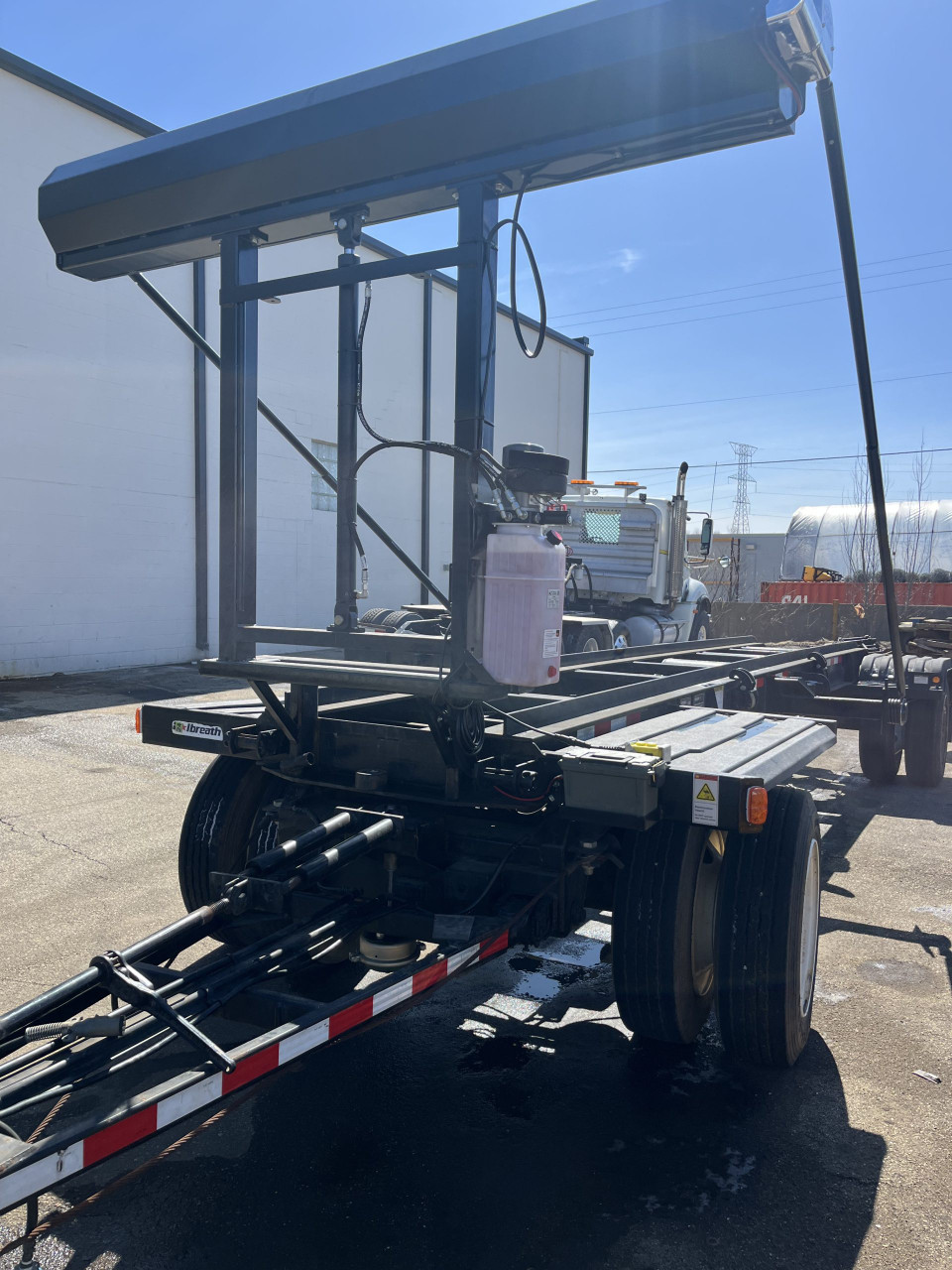 Pioneer Covering Systems steel arm truck tarp kit with black mesh cover