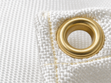 24 oz. Insul-Shield Fiberglass Welding Blanket - Close-up of white fiberglass weave texture with brass grommet