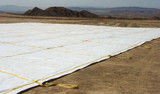 8.4 oz. 12 mil Black/White Polyethylene String Reinforced Landfill Covers