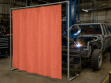17 oz. Salmon Neoprene Coated Fiberglass Welding Blanket - In Use as Vertical Welding Curtain in Automotive Shop