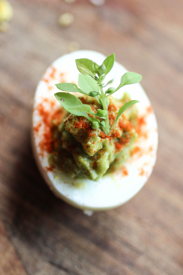 Spicy Guacamole Stuffed Eggs