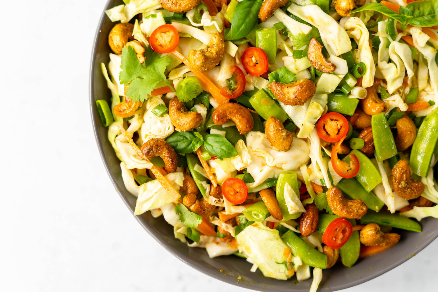 Spicy Chopped Salad with Sesame Lime Vinaigrette and Curry Cashews