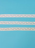 A narrow insertion lace, ideal for using to attach to ribbon hole lace, beading or edging lace or straight to fabric, a very useful simple pattern which goes well with other laces, 
1 cm wide, 95% cotton 5% nylon, Available in White, Off White and Ecru, Priced per metre