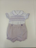 A lovely little button on suit, Size 6-12 month, wisteria coloured hand smocking, wisteria piping, Plum coloured button on pants, Elastic back waistband, Elasticated round the legs, Shirt made from 100% cotton poplin, Pants made from 100% sun-washed chambray, Wash at 30 degrees, 