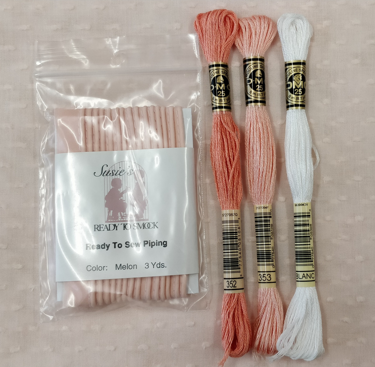 Suggestions for thread and piping for the peachy pink Swiss plumetis Suggestions for thread and piping for the peachy pink Swiss plumetis