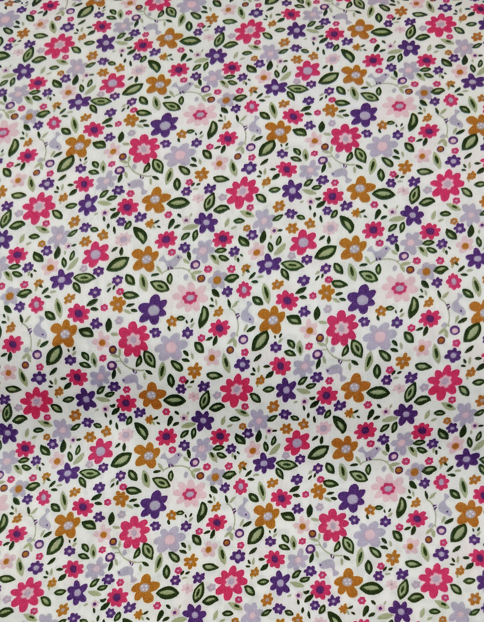 A lovely quality cotton print, Brightly coloured flower design, 100% cotton
45" 110 cm wide, Ideal for smocking projects, Wash at 30 degrees, 
Priced per metre