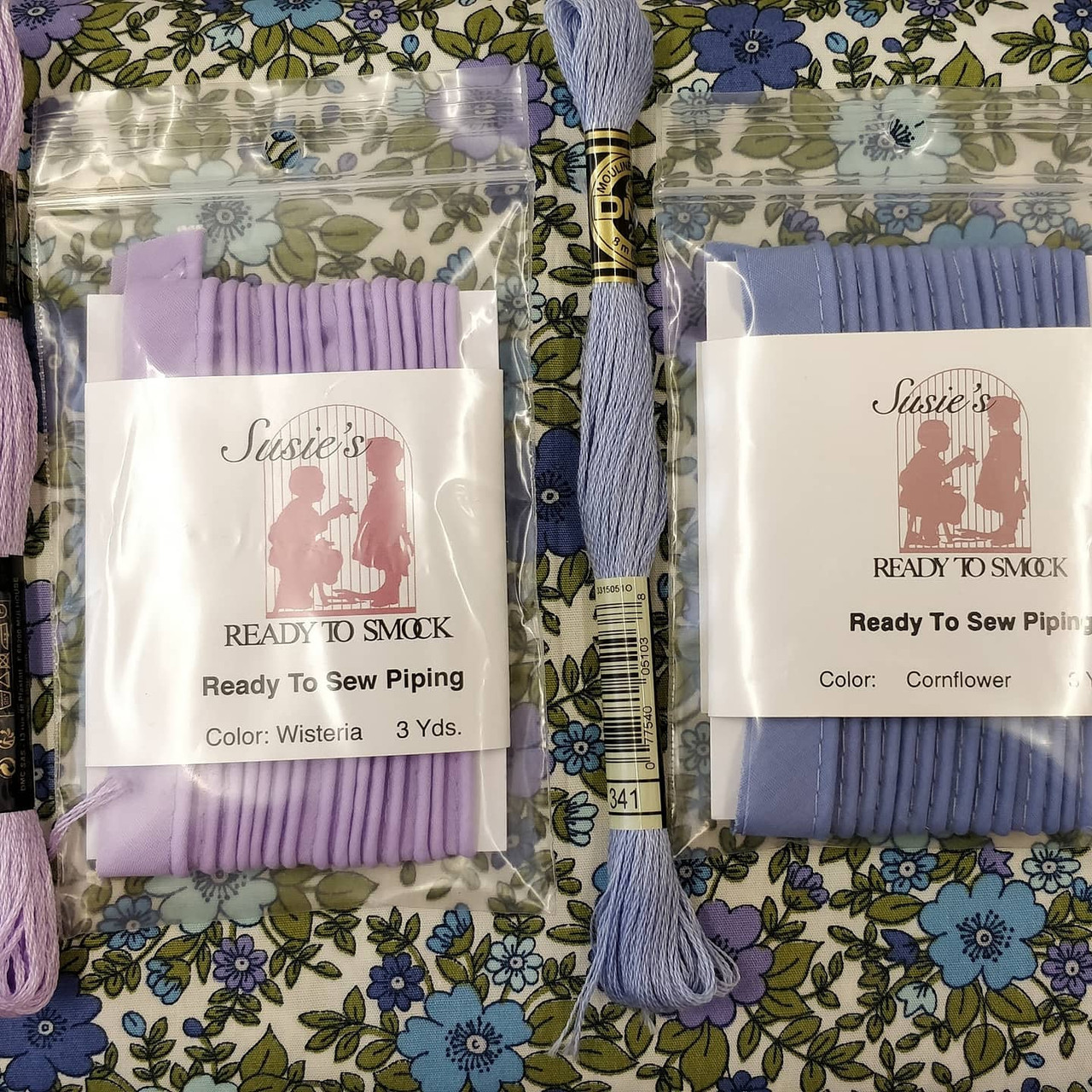 Rose & Hubble floral blues and purple shades fabric with matching piping and threads