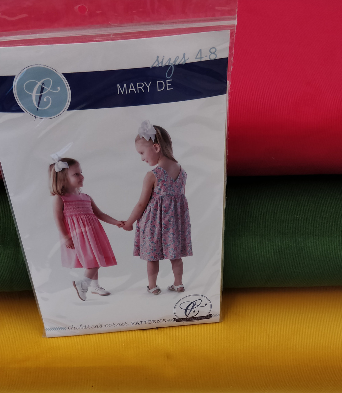 Baby needlecord shown with suggested pattern Mary De by Children's Corner