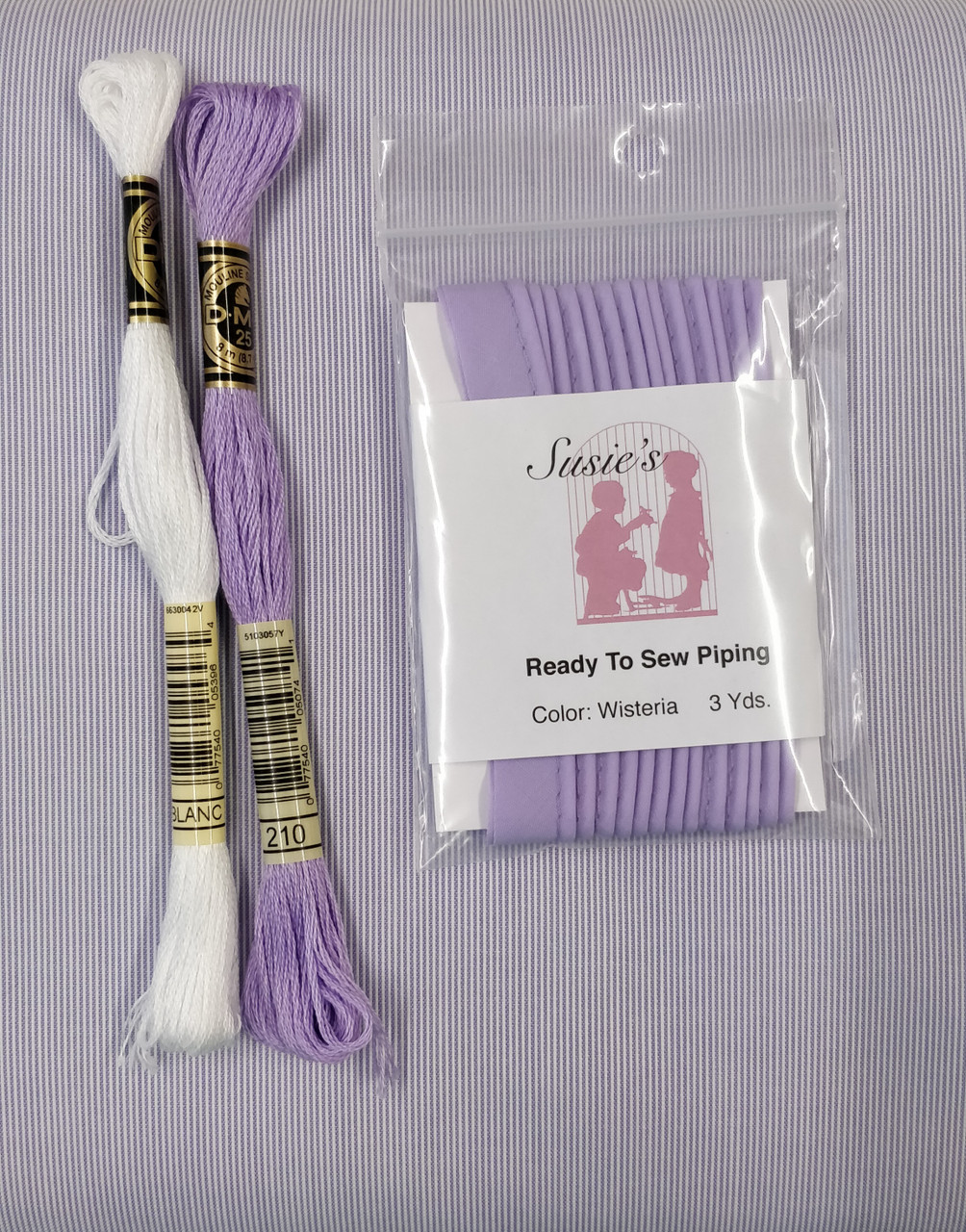 Lavender pin feather baby cord shown here with suggested matching piping and thread colours 