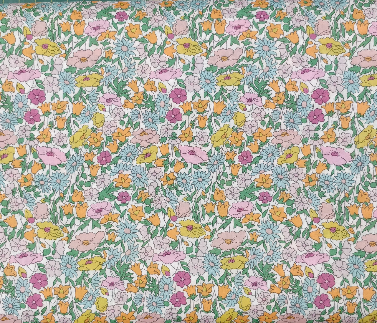 Liberty Tana Lawn Poppy Forest, 100% cotton, 136 cm wide, Wash at 30 degrees, Priced per metre, Part metres available, Ideal for all your smocking projects, I recommend you put a backing to the smocked area before pleating, Poppy Forest is a simplified floral created with a very fine outline, taking a wild all-over meadow appearance, It is a reworked and rescaled new iteration of our iconic Poppy & Daisy print – the first appearance of this design was around 1917, It was wood block printed at Liberty’s Merton print works.