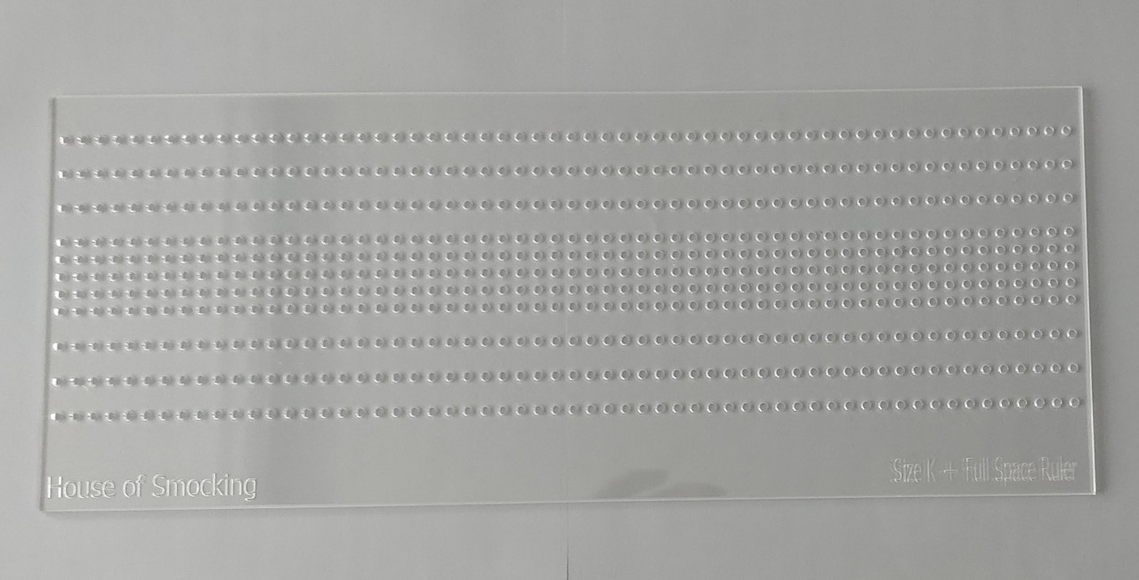 Lots more rows on this new ruler, top row set 1 cm from the top so you can line the top up with the top of your fabric. 