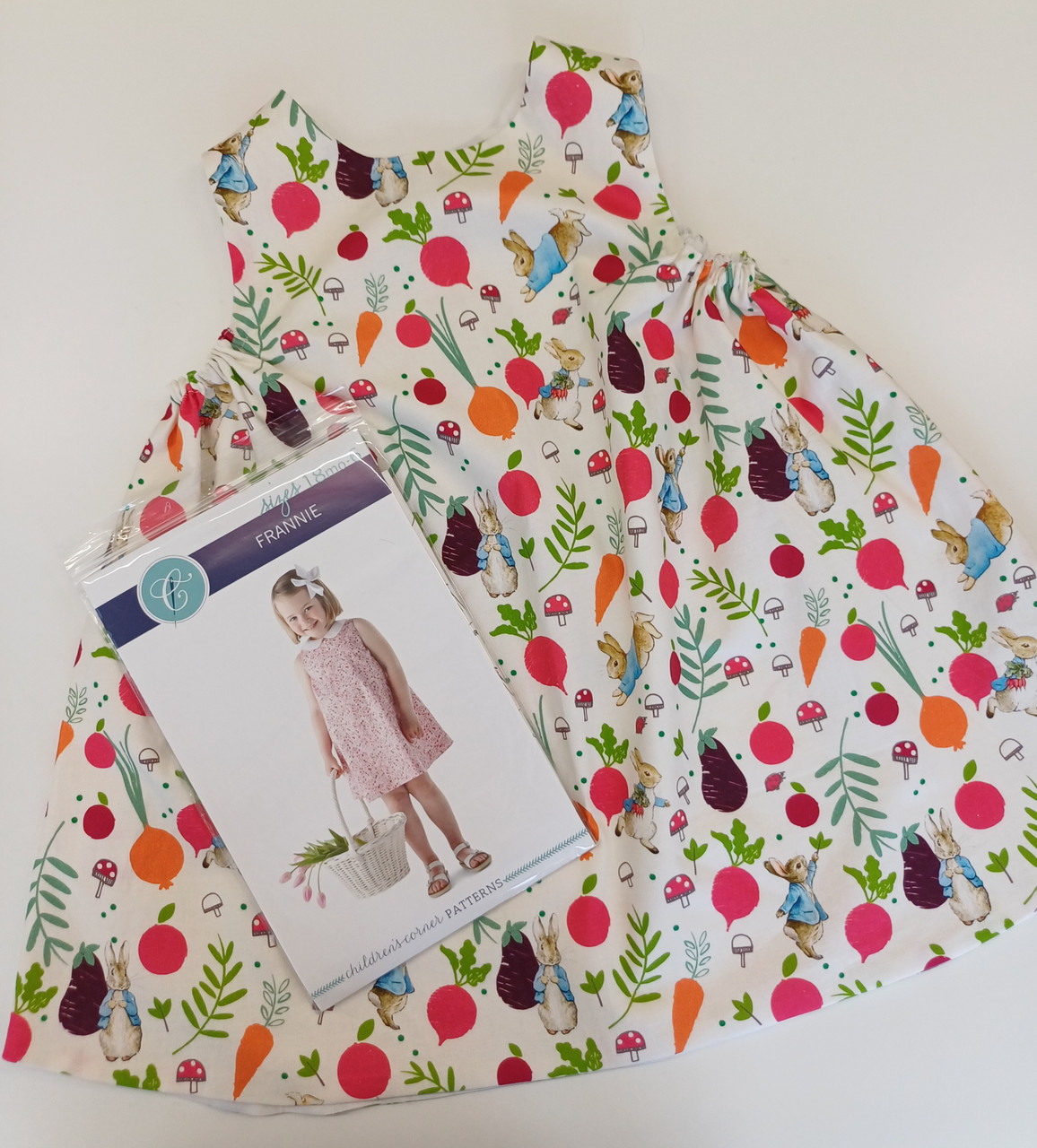Frannie pattern by Children's Corner made up in this Peter Rabbit fabric made up 
