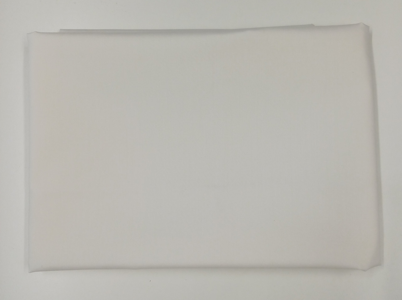 An end of roll piece of Rice coloured imperial broadcloth, 35% cotton 65% polyester, 98 cm x 150 cm, Wash at 30 degrees, 