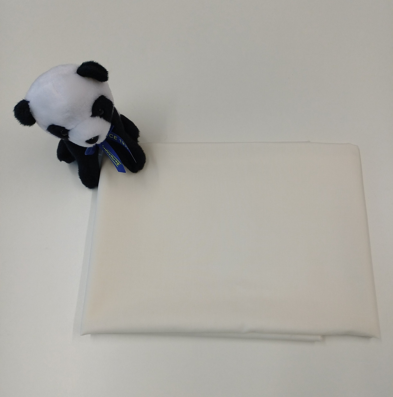 End of roll piece of Rice coloured imperial batiste, Enough for a baby gown or maybe a diaper set, 35% cotton 65% poly, 83 cm x 150 cm, Wash at 30 degrees

