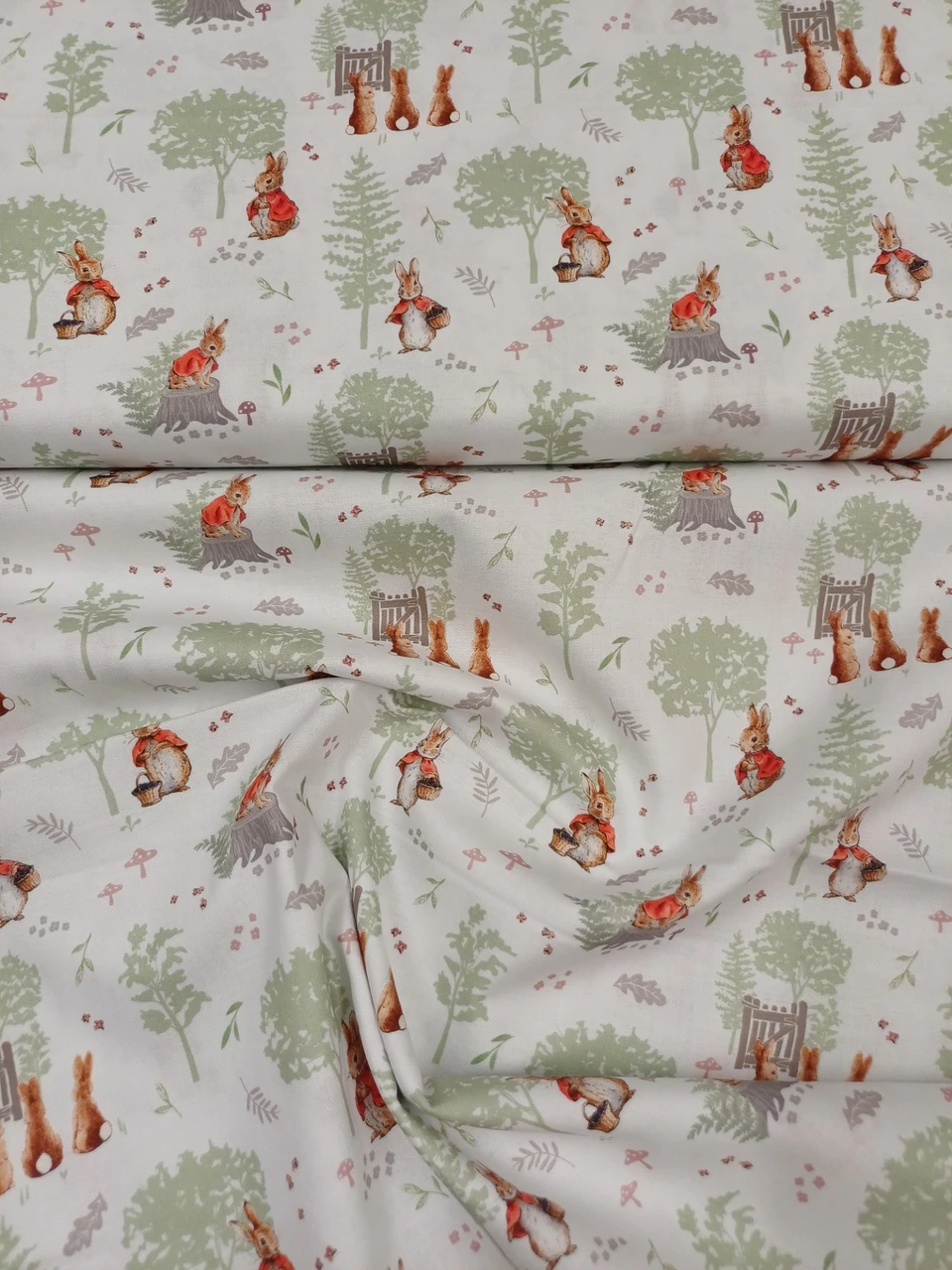 Peter Rabbit Tales of the Burrows Forest, Peter Rabbit in a woodland scene, A lovely 100% organic cotton, 112 cm wide, Cool hand wash, cool iron, drip dry, Do not bleach
Under licence - sold for non commercial home use, Priced per metre