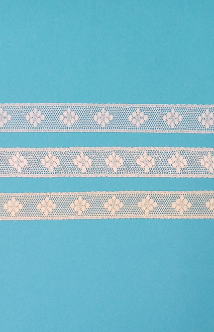 A matching diamond design edging lace and a wide edging lace are also available, attach to edging lace, beading or fabric, 1.7 cm wide priced per metre, 95% cotton 5% nylon
Available in White, White and ecru