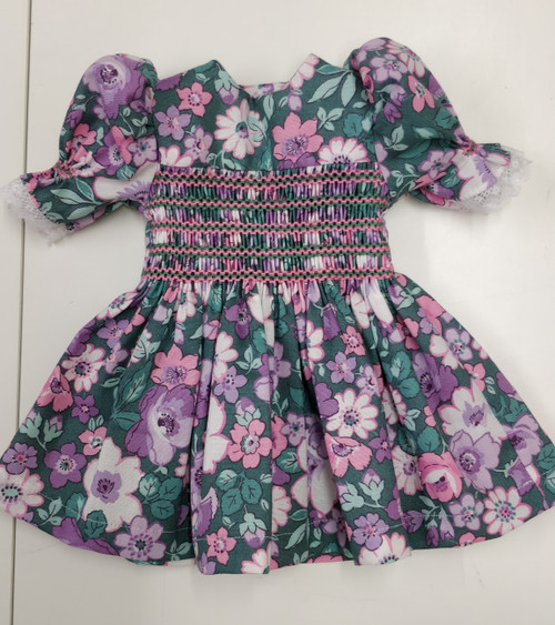 Dolls dress made in Hedgerow Bloom, I used DMC thread pink 603 and green 502