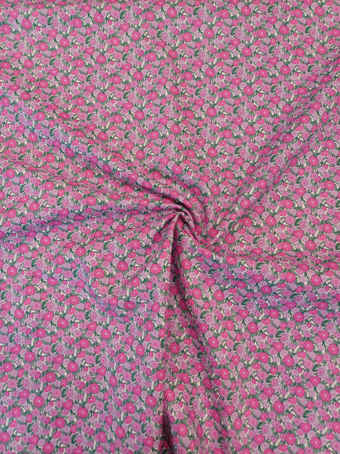 Liberty Heirloom 1 Quilting or craft cotton, Marguerite Meadow, A cheery field of pretty Marguerites appear to dance and sway amidst the warm breeze, In this timeless and versatile botanical, The styalised flowerheads incorporate Liberty's quintessential fine outline and create a subtle retro aesthetic, 100% Lasenby cotton, 112 cm wide, Wash at 30 degrees, Priced per metre, shown with a ruler for scale of design