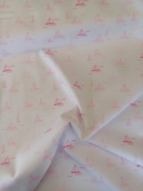 A really lovely quality pink on white fabric, Cute sailboats in two shades on pink, 100% cotton, 150 cm wide, Ideal for dresses, blouses, shorts and so much more, Wash at 30 degrees, Priced per metre