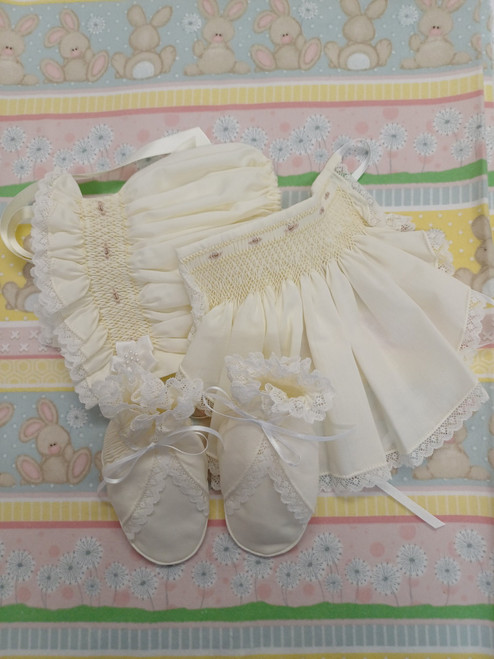 A beautiful bonnet, bib and bootee set, Sized to fit 3 -6 months, Made in Rice coloured imperial batiste, Wash at 30 degrees