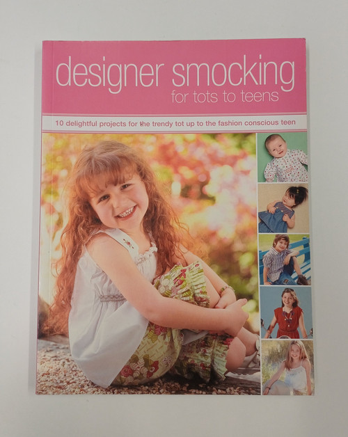 A used but good condition Designer Smocking for Tot to Teens, 10 delightful projects for the trendy tot up to the fashion conscious teen, Patterns still attached inside, 
Good clear instructions on construction and how to do the smocking