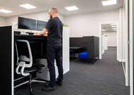 Dual monitor arms for workspaces