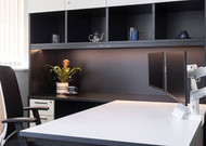 Importance of desk material and construction to monitor arm performance