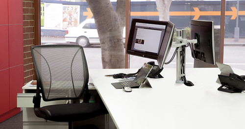 ATDEC AFS-AT-DC White dual swing arm desk mount with silver and white design components.