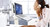ATDEC Af-AT-NBC-P silver monitor laptop mount with ergonomic adjustable swing arms and tray.