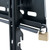 ATDEC TH-3070-UT black metal tilt wall mount with security bar in a retail environment, holding large displays up to 200lb. ATDEC TH-3070-UT black metal tilt wall mount with security bar in a retail environment, holding large displays up to 200lb.