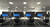 ATDEC AWMS-3-TH467 triple monitor stack setup with ultrawide and two smaller screens black.