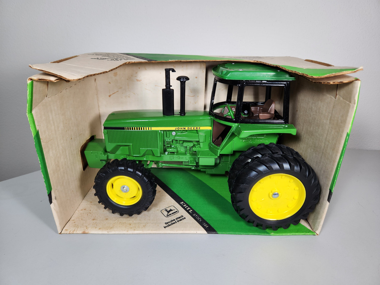 1:16 John Deere 4850 Tractor with Duals, FWA and Cab by Ertl