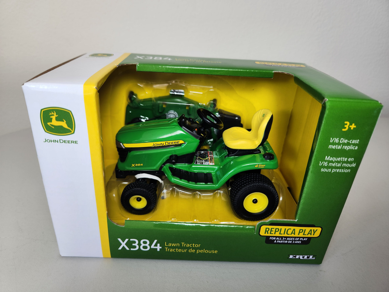 1:16 John Deere X384 Lawn Tractor with Mower Deck by Ertl