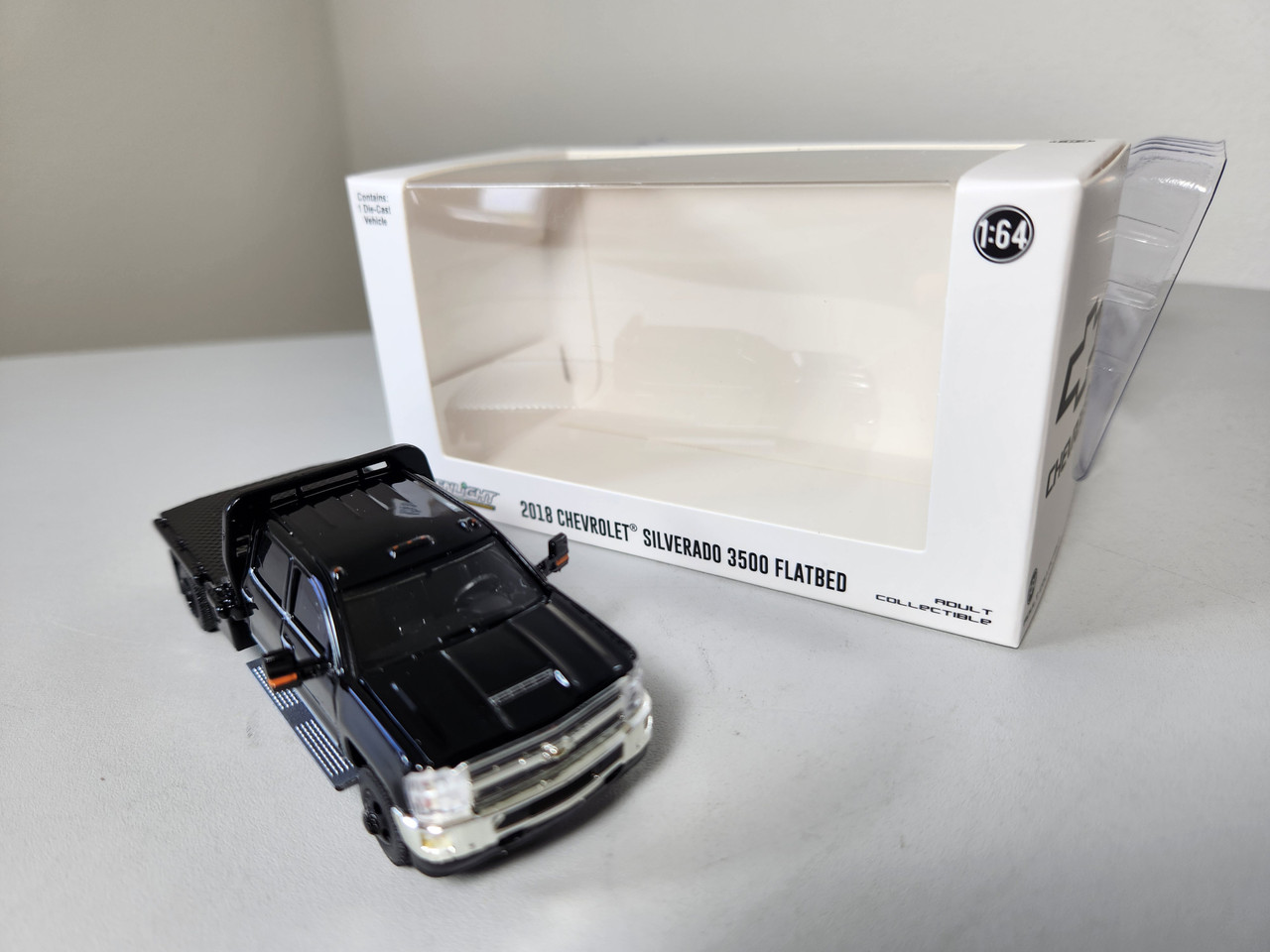 1:64 2018 Chevrolet Silverado 3500 Flat Bed Dually - Black