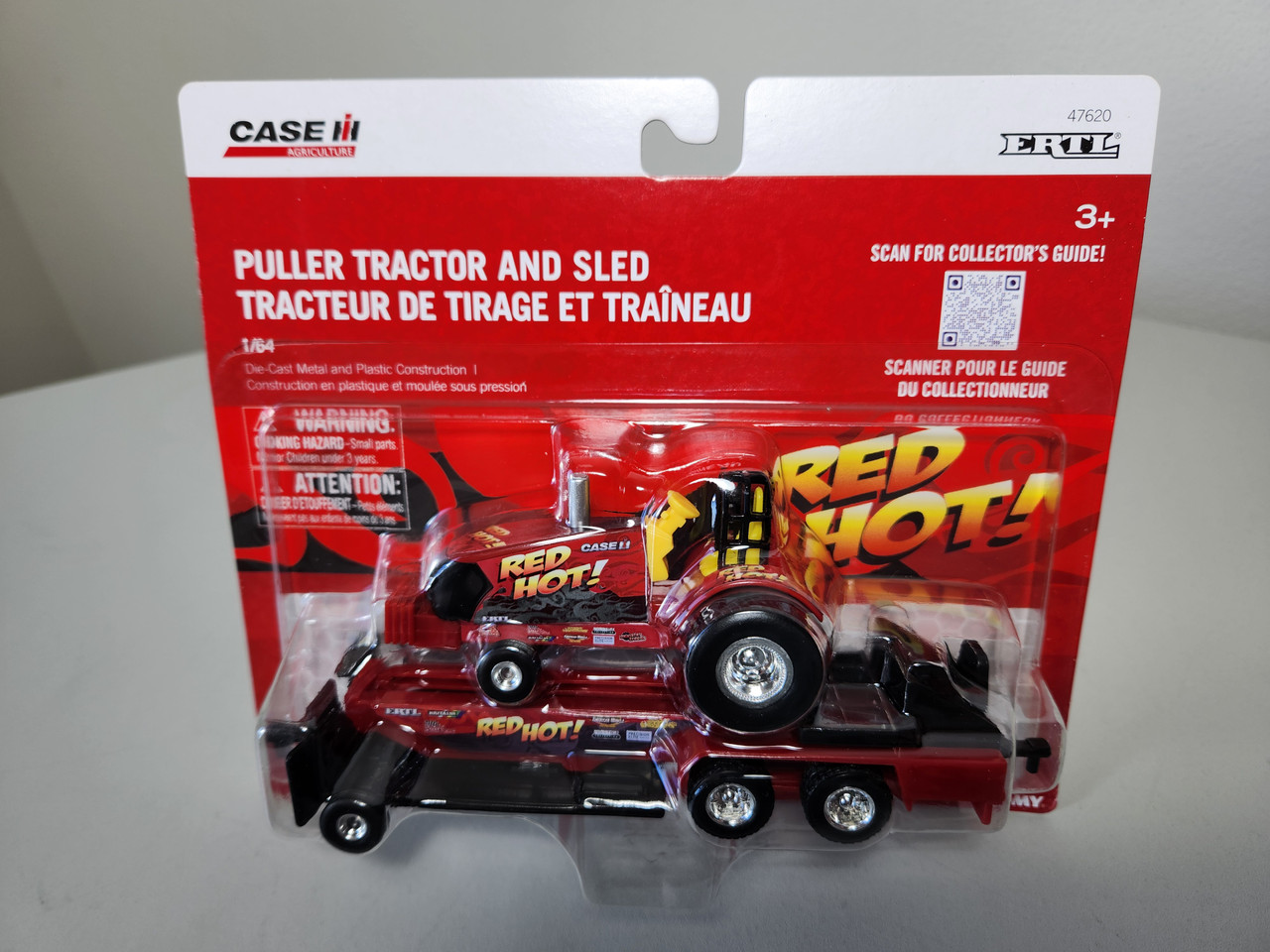 1:64 Case IH Red Hot Pulling Tractor and Sled by Ertl - Town and